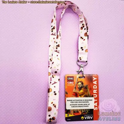 Sweet Treats Lanyard, a cute lanyard featuring cakes, cookies and candy.